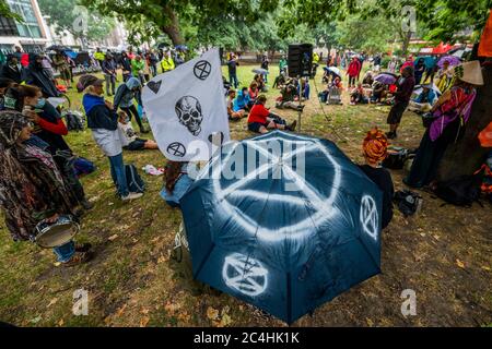 London, UK. 27th June, 2020. The Extinction Rebellion Rebel Trail walkers and protest against HS2 arrives at the end of its journey, which involved walking along the proposed route. The eased 'lockdown' continues for the Coronavirus (Covid 19) outbreak in London. Credit: Guy Bell/Alamy Live News Stock Photo