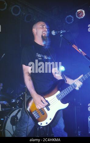 Nick Oliveri in Queens of the Stoneage performing at The Garage 28/08/2000, London, England, United Kingdom. Stock Photo