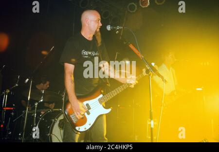 Nick Oliveri in Queens of the Stoneage performing at The Garage 28/08/2000, London, England, United Kingdom. Stock Photo