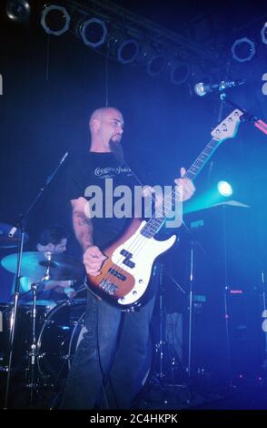 Nick Oliveri in Queens of the Stoneage performing at The Garage 28/08/2000, London, England, United Kingdom. Stock Photo