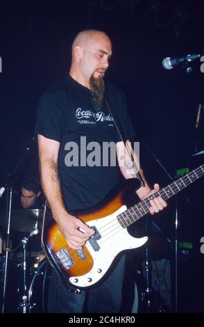 Nick Oliveri in Queens of the Stoneage performing at The Garage 28/08/2000, London, England, United Kingdom. Stock Photo