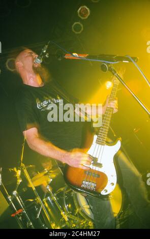 Nick Oliveri in Queens of the Stoneage performing at The Garage 28/08/2000, London, England, United Kingdom. Stock Photo