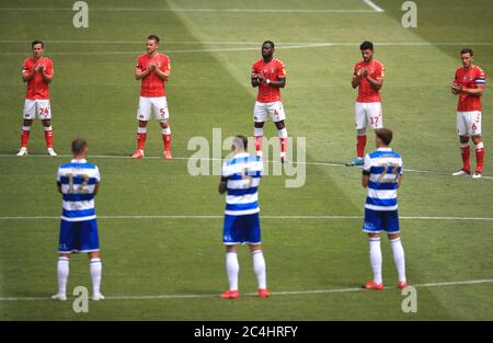 Charlton Athletic and Queens Park Rangers players take part in a minutes applause in memory of Seb Lewis, Theo Foley those lost these last few months during the Sky Bet Championship match at The Valley, London. Stock Photo