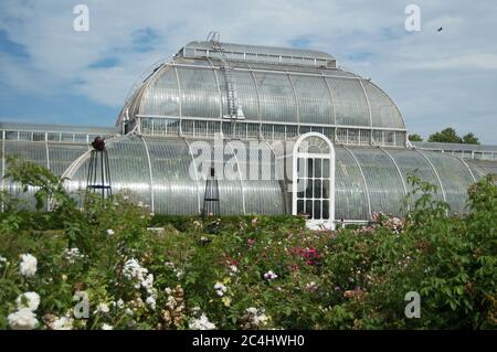 Palm House from the rose gardens, Kew Gardens, England Stock Photo