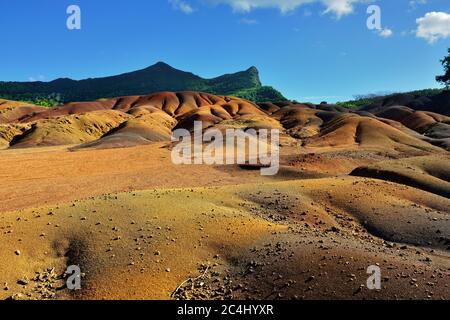 Main sight of Mauritius island. Unusual volcanic formation seven colored earths in Chamarel. Stock Photo
