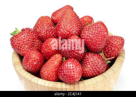 Fresh strawberries in wooden bowl isolated on white background. Full depth of field with clipping path. Stock Photo