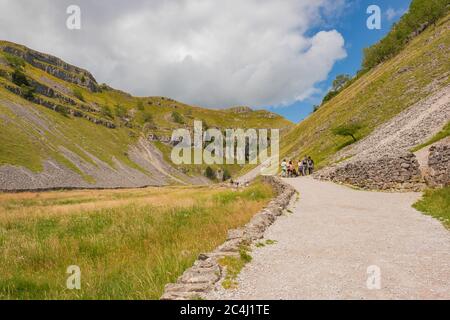 Dramatic view of the nature geological wonder of Malham Cove in the heart of the Yorkshire Dales. A popular tourist destination and waterfall. Stock Photo