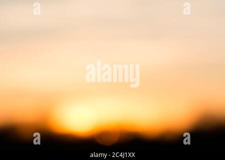Beautiful bokeh background of orange sunset Stock Photo