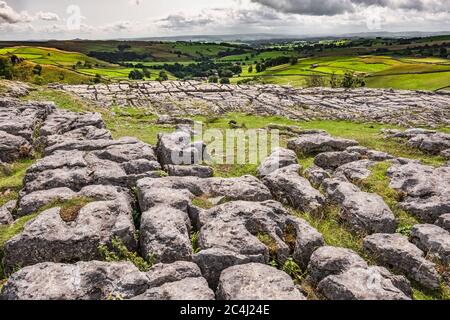 Dramatic view of the nature geological wonder of Malham Cove in the heart of the Yorkshire Dales. Stock Photo