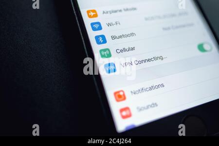 iPhone interface and vpn connection on the screen. Stock Photo