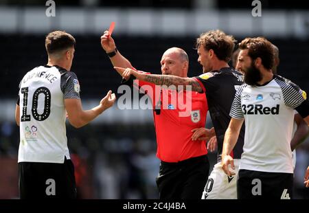 Derby County's Tom Lawrence is shown a red card by referee Scott Duncan during the Sky Bet Championship match at Pride Park, Derby. Stock Photo