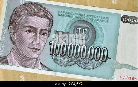 Obverse of 100 million dinars paper bill issued by Yugoslavia, that shows portrait of young man Stock Photo
