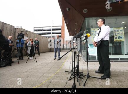 PSNI Superintendent Muir Clark speaks to media as a body that police believe to be missing Belfast teenager Noah Donohoe was found in a storm drain. Stock Photo