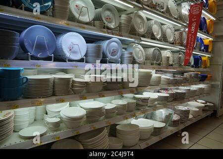 Dishes And Bowls Stacked For Sell At A Shop . Different Selections Of Plates In Sale In Front Of The Shop. Selections Have Different Prices. Varieties Stock Photo