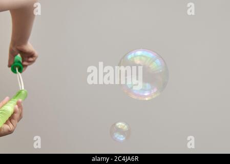 Photo of multi-colored soap bubbles, creative background, selective focus Stock Photo