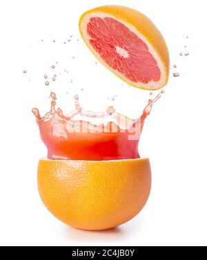 juice splashing out of a grapefruit isolated on white Stock Photo