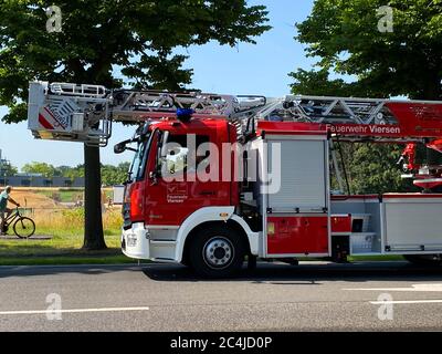 Viersen, Germany - June 23. 2020: View on red german firefighter truck on streets of city Stock Photo
