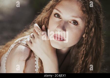 Close-up portrait of young redhead woman Stock Photo