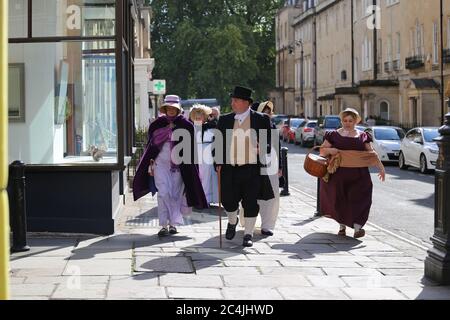 Vintage style dressed people walking at the Regency Costumed Promenade,the 200th anniversary of Jane Austen's death in Bath,England,UK,09/09/2017 Stock Photo