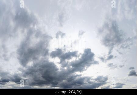 Sky dramatic panoramic grey view with clouds nice contrast blue scenic beautiful air cloudscape nature background Stock Photo
