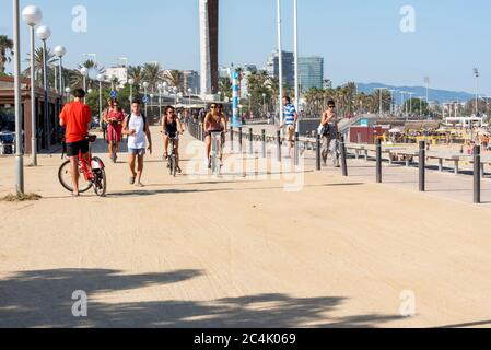 BARCELONA - JUNE 26, 2020: Platja de la Nova Icària beach with people in summer after COVID 19 on June 26, 2020 in Barcelona, Spain. Stock Photo