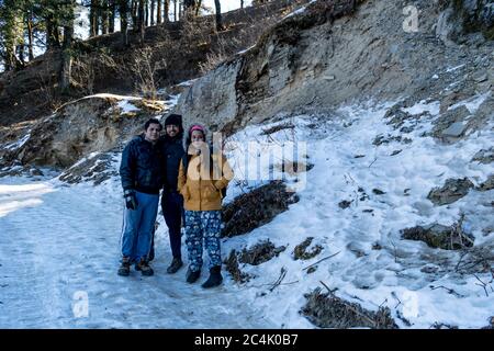 Narkanda, Himachal Pradesh, India; 28-Dec-2018; posing while hiking to Agyaat Vaas/ Hatu Peak Stock Photo