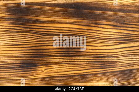 Raw burnt wood texture background. Stock Photo