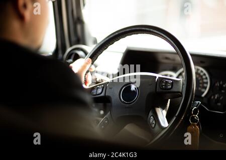 driving car chauffeur personal driver taxi hummer wedding car Stock Photo