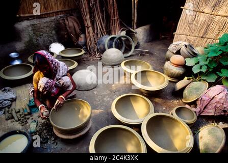 Colourful earthenware like pots, jars and vases enhance the beauty of city households. Besides, it is a source of livelihood to many potters. Banglade Stock Photo