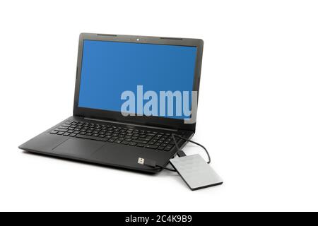 a USB external hard drive drive on a computer,  a source of computer security risk Stock Photo