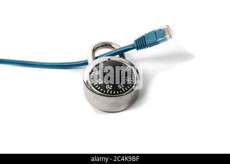 a lock around a network LAN cable signifying keeping computer hackers out Stock Photo