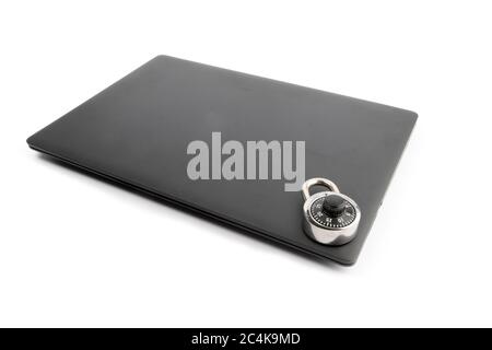a closed notebook computer with a combination lock on it isolated on white Stock Photo