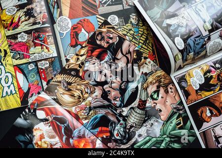 Open comic book, pages with heroes close up. background Stock Photo