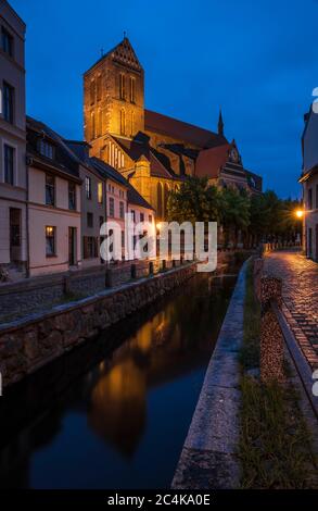 Litte street in Wismar at night. Stock Photo