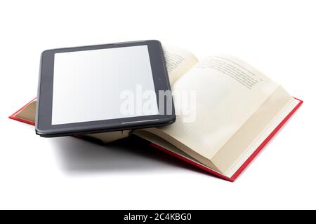 old and new way to read - an e-book reader app on a tablet with an open traditional hard cover books isolated on white Stock Photo