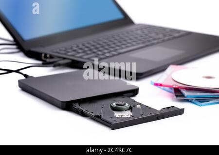 desktop computer with CD in drive and floppy disk in drive Stock Photo ...