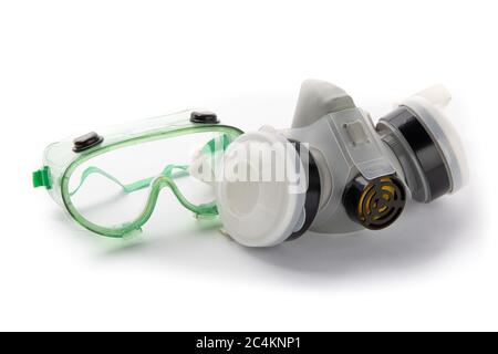 an industrial high efficiency half mask respirator and safety goggles isolated on white Stock Photo