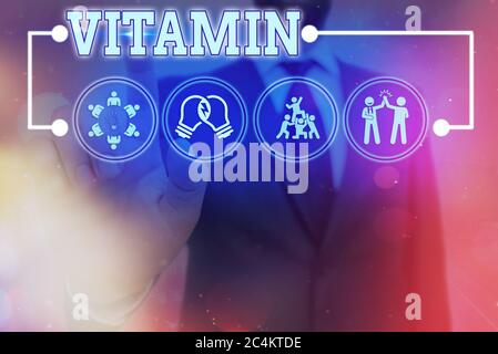 Handwriting text Vitamin. Conceptual photo organic molecule that is essential micronutrient that organism needs Information digital technology network Stock Photo