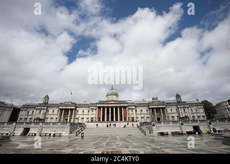 London, UK. 27th June, 2020. Trafalgar Square, with the National Gallery in the distance, is very quiet for a Saturday lunchtime in June, most probably due to the COVID-19 pandemic meaning people are staying away. Credit: Paul Marriott/Alamy Live News Stock Photo