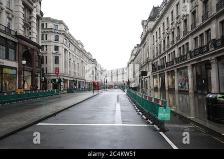 London, UK. 27th June, 2020. New barriers in the road, for added social distancing, on Regent Street in London. Credit: Paul Marriott/Alamy Live News Stock Photo