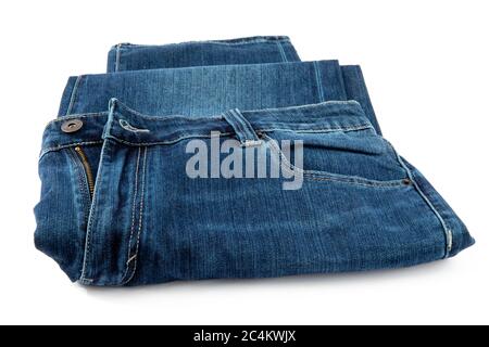 a pair of loosely folded denim blue jeans isolated on white Stock Photo