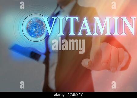 Word writing text Vitamin. Business photo showcasing organic molecule that is essential micronutrient that organism needs Futuristic icons solar syste Stock Photo