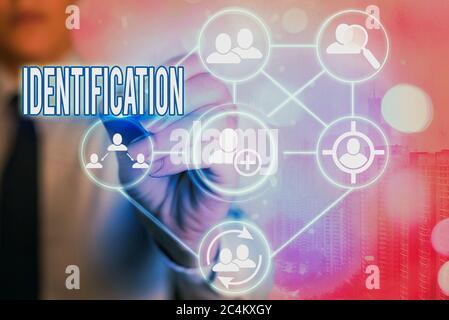 Writing note showing Identification. Business concept for an action or ...