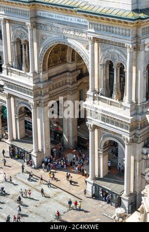 Milan, Italy - May 16, 2017: People visit the Galleria Vittorio Emanuele II on Cathedral Square in Milan. This gallery is famous tourist attraction of Stock Photo