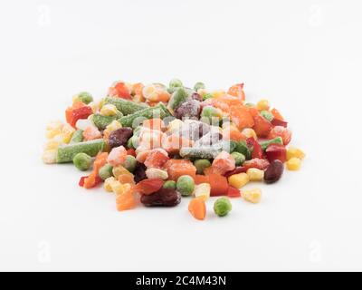Frozen vegetables on a white background. Mexican blend. Stock Photo