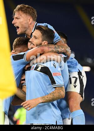 Rome. 28th June, 2020. Lazio's Luis Alberto (front) celebrates his goal with his teammates during a Serie A football match between Lazio and Fiorentina in Rome, Italy, June 27, 2020. Credit: Xinhua/Alamy Live News Stock Photo