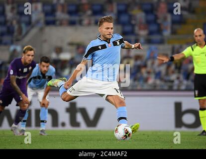 Rome. 28th June, 2020. Lazio's Ciro Immobile (C) scores a penalty shot during a Serie A football match between Lazio and Fiorentina in Rome, Italy, June 27, 2020. Credit: Xinhua/Alamy Live News Stock Photo