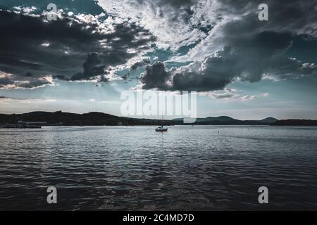 A cloudy before-thunderstorm afternoon at Lake Memphremagog, from New Port, Vermont Stock Photo