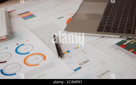 Graphs, charts, business table. The workplace of business people. Stock Photo