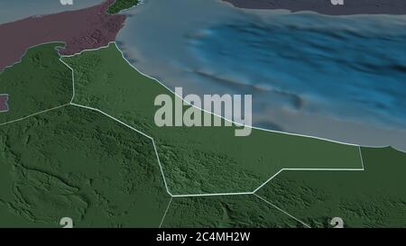 Zoom in on Al Batinah North (region of Oman) outlined. Oblique perspective. Colored and bumped map of the administrative division with surface waters. Stock Photo